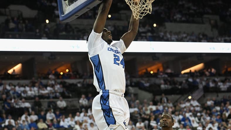 Mar 1, 2023; Omaha, Nebraska, USA;  Creighton Bluejays forward Arthur Kaluma (24) dunks the ball against the Georgetown Hoyas in the second half at CHI Health Center Omaha. Mandatory Credit: Steven Branscombe-USA TODAY Sports