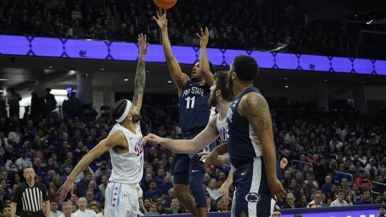 Mar 1, 2023; Evanston, Illinois, USA; Penn State Nittany Lions guard Camren Wynter (11) shoots over Northwestern Wildcats guard Boo Buie (0) during the first half at Welsh-Ryan Arena. Mandatory Credit: David Banks-USA TODAY Sports