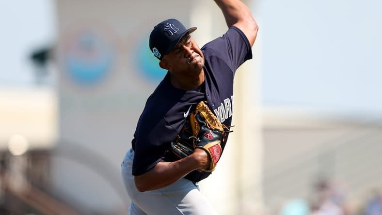 Mar 2, 2023; Bradenton, Florida, USA; New York Yankees relief pitcher Wandy Peralta (58) throws a pitch against the Pittsburgh Pirates in the second inning during spring training at LECOM Park. Mandatory Credit: Nathan Ray Seebeck-USA TODAY Sports