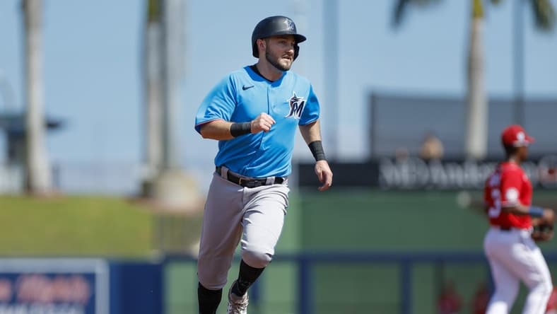 Mar 2, 2023; West Palm Beach, Florida, USA; Miami Marlins second baseman Garrett Hampson (1) runs toward third base during the second inning against the Washington Nationals at The Ballpark of the Palm Beaches. Mandatory Credit: Sam Navarro-USA TODAY Sports