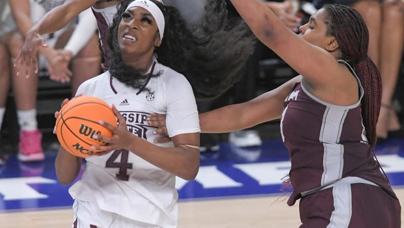 Mississippi State forward Jessika Carter (4) scores near Texas A&M forward Jada Malone (13) during the fourth quarter of the SEC Women's Basketball Tournament at Bon Secours Wellness Arena in Greenville, S.C. Thursday, March 2, 2023. Texas A&M won 79-72.
Texas A M Vs Mississippi State 2023 Sec Women S Basketball Tournament In Greenville Sc