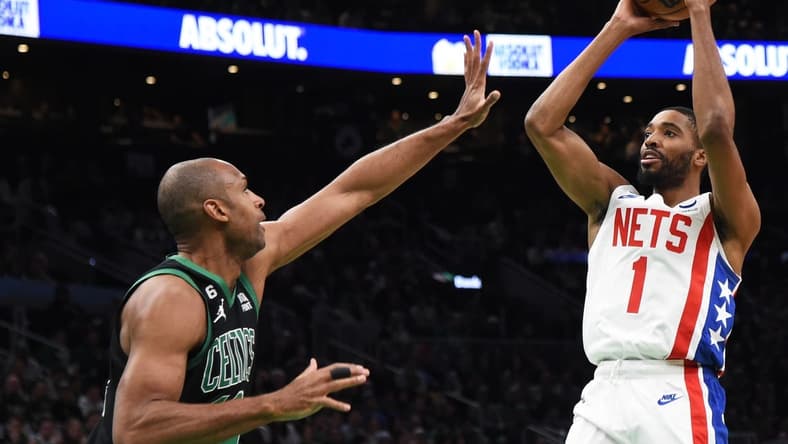 Mar 3, 2023; Boston, Massachusetts, USA;  Brooklyn Nets forward Mikal Bridges (1) shoots the ball over Boston Celtics center Al Horford (42) during the first half at TD Garden. Mandatory Credit: Bob DeChiara-USA TODAY Sports