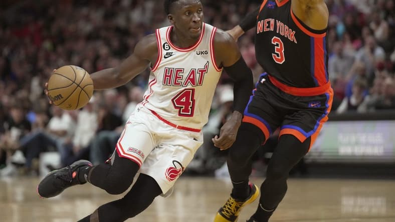 Mar 3, 2023; Miami, Florida, USA; Miami Heat guard Victor Oladipo (4) drives to the basket past New York Knicks guard Josh Hart (3) during the second half at Miami-Dade Arena. Mandatory Credit: Jim Rassol-USA TODAY Sports