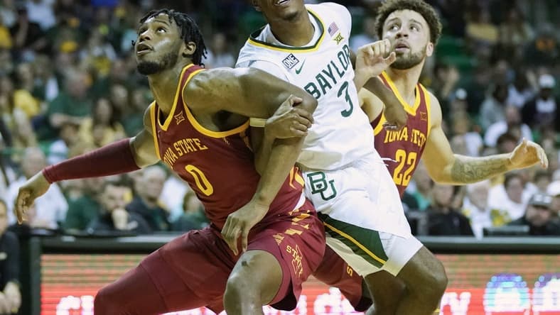 Mar 4, 2023; Waco, Texas, USA; Iowa State Cyclones forward Tre King (0) boxes out  Baylor Bears guard Dale Bonner (3) on a free throw during the second half at Ferrell Center. Mandatory Credit: Raymond Carlin III-USA TODAY Sports