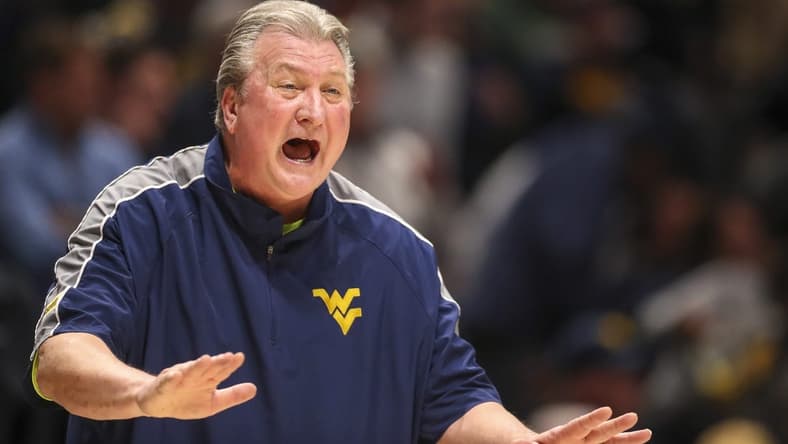 Mar 4, 2023; Morgantown, West Virginia, USA; West Virginia Mountaineers head coach Bob Huggins yells during the first half against the Kansas State Wildcats at WVU Coliseum. Mandatory Credit: Ben Queen-USA TODAY Sports