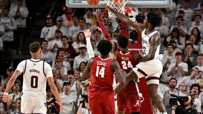 Mar 4, 2023; College Station, Texas, USA; Texas A&M Aggies forward Solomon Washington (13) blocks the shot of Alabama Crimson Tide forward Brandon Miller (24) during the second half at Reed Arena. Mandatory Credit: Maria Lysaker-USA TODAY Sports