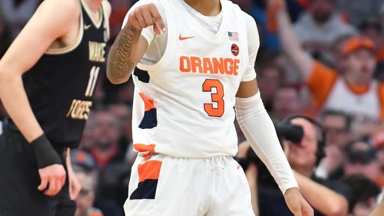 Mar 4, 2023; Syracuse, New York, USA; Syracuse Orange guard Judah Mintz (3) reacts to drawing a foul after making a basket in the first half against the Wake Forest Demon Deacons at JMA Wireless Dome. Mandatory Credit: Mark Konezny-USA TODAY Sports
