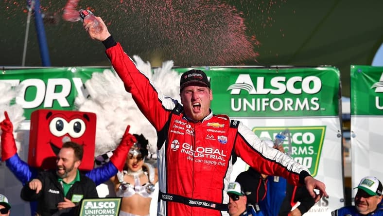 Mar 4, 2023; Las Vegas, Nevada, USA; NASCAR Xfinity Series driver Austin Hill (21) celebrates his victory of the Xfinity Series Alsco Uniforms 300 at Las Vegas Motor Speedway. Mandatory Credit: Gary A. Vasquez-USA TODAY Sports