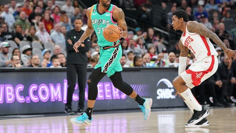 Mar 4, 2023; San Antonio, Texas, USA;  San Antonio Spurs forward Keita Bates-Diop dribbles up court during the first quarter of a game against the Houston Rockets at the AT&T Center. Mandatory Credit: Aaron Meullion-USA TODAY Sports