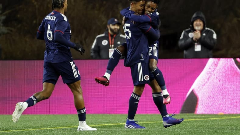 Mar 4, 2023; Foxborough, Massachusetts, USA; New England Revolution defender Brandon Bye (15) celebrates scoring a goal with forward Latif Blessing (19) in the second half against the Houston Dynamo FC at Gillette Stadium. Mandatory Credit: Winslow Townson-USA TODAY Sports
