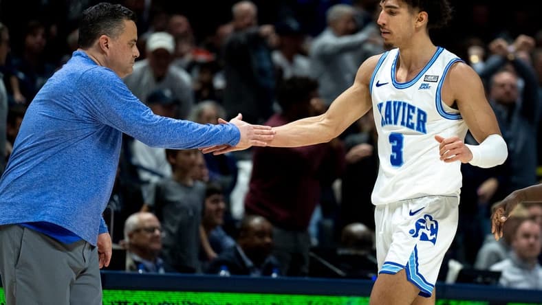 Xavier Musketeers guard Colby Jones (3) high fives Xavier Musketeers head coach Sean Miller in the second half of the NCAA men s basketball game at the Cintas Center in Cincinnati on Saturday, March 4, 2023. Xavier Musketeers defeated Butler Bulldogs 78-66.
Ncaa Basketball Butler Bulldogs At Xavier Musketeers