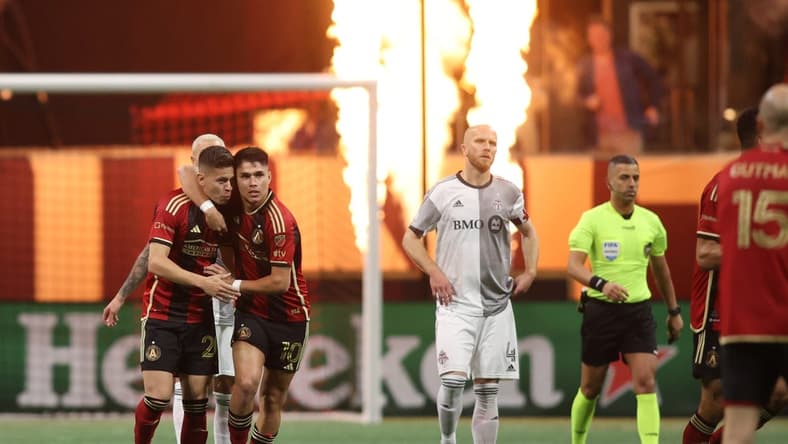 Mar 4, 2023; Atlanta, Georgia, USA; Atlanta United midfielder Matheus Rossetto (20) celebrates with teammates after scoring a goal against the Toronto FC during the second half at Mercedes-Benz Stadium. Mandatory Credit: Brett Davis-USA TODAY Sports