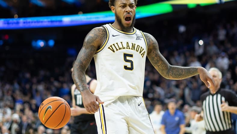 Mar 4, 2023; Philadelphia, Pennsylvania, USA; Villanova Wildcats guard Justin Moore (5) reacts after a score against the Connecticut Huskies during the second half at Wells Fargo Center. Mandatory Credit: Bill Streicher-USA TODAY Sports