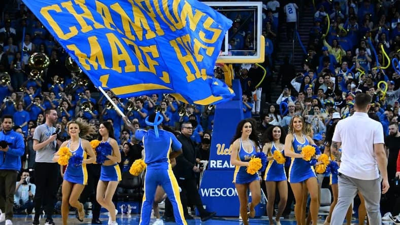 Mar 4, 2023; Los Angeles, California, USA; UCLA Bruins cheerleaders celebrate after the Bruins defeated the Arizona Wildcats at Pauley Pavilion presented by Wescom. Mandatory Credit: Richard Mackson-USA TODAY Sports