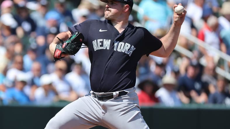 Mar 5, 2023; North Port, Florida, USA; New York Yankees starting pitcher Carlos Rodon (55) throws a pitch during the first inning against the Atlanta Braves at CoolToday Park. Mandatory Credit: Kim Klement-USA TODAY Sports