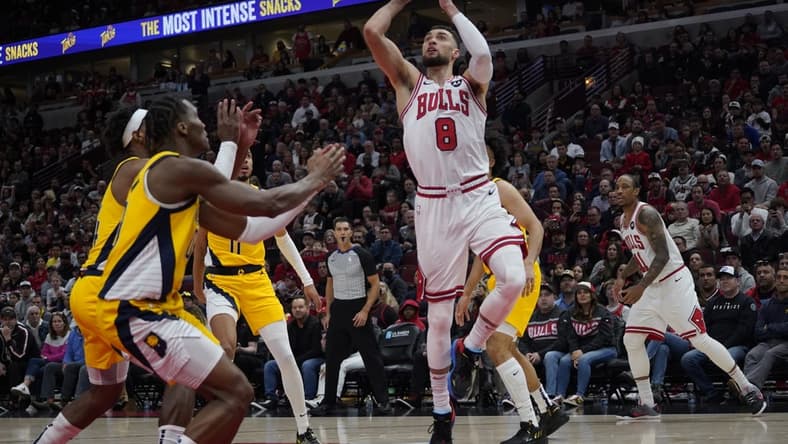 Mar 5, 2023; Chicago, Illinois, USA; Indiana Pacers guard Bennedict Mathurin (00) defends Chicago Bulls guard Zach LaVine (8) during the second quarter at United Center. Mandatory Credit: David Banks-USA TODAY Sports