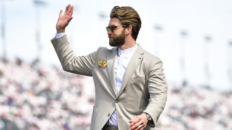 Mar 5, 2023; Las Vegas, Nevada, USA; Philadelphia Phillies right fielder Bryce Harper is introduced before the Pennzoil 400 at Las Vegas Motor Speedway. Mandatory Credit: Gary A. Vasquez-USA TODAY Sports
