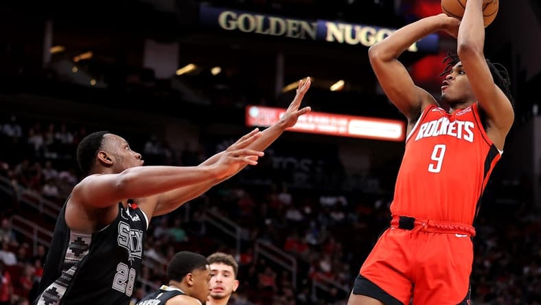 Mar 5, 2023; Houston, Texas, USA; Houston Rockets guard Josh Christopher (9) shoots against San Antonio Spurs center Charles Bassey (28) during the second quarter at Toyota Center. Mandatory Credit: Erik Williams-USA TODAY Sports