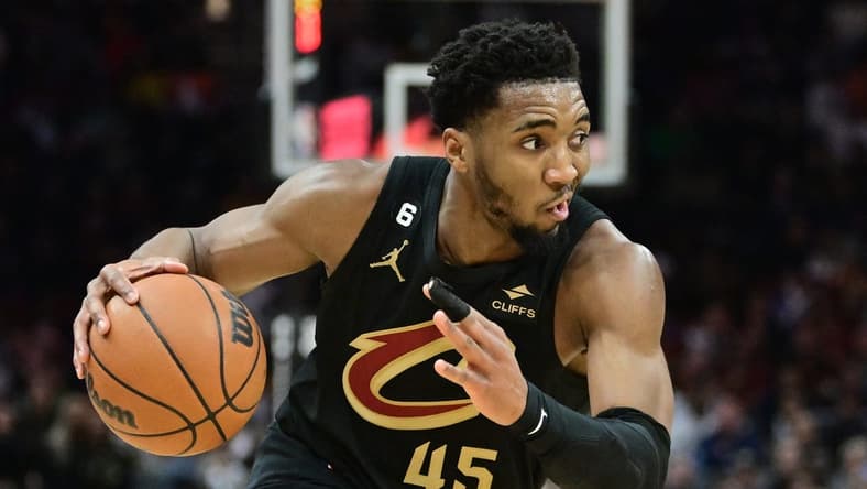 Mar 6, 2023; Cleveland, Ohio, USA; Cleveland Cavaliers guard Donovan Mitchell (45) drives to the basket against the Boston Celtics during the second half at Rocket Mortgage FieldHouse. Mandatory Credit: Ken Blaze-USA TODAY Sports