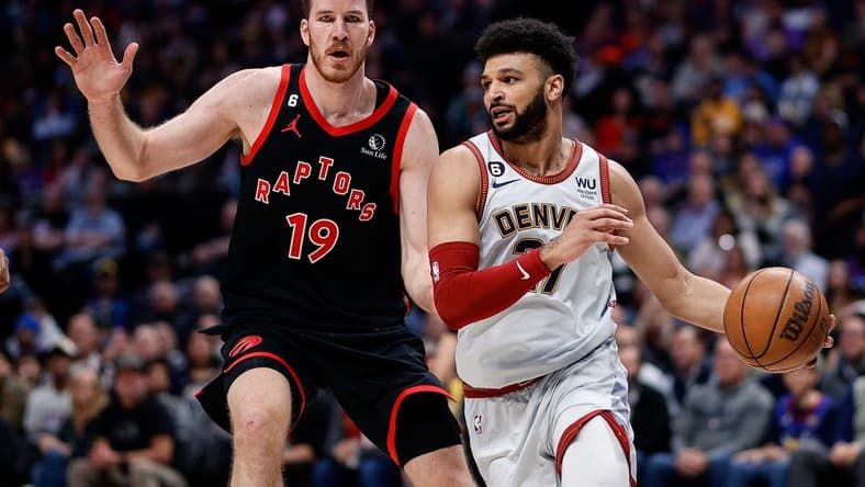 Mar 6, 2023; Denver, Colorado, USA; Denver Nuggets guard Jamal Murray (27) controls the ball ahead of Toronto Raptors center Jakob Poeltl (19) in the second quarter at Ball Arena. Mandatory Credit: Isaiah J. Downing-USA TODAY Sports