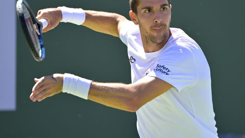 Mar 7, 2023; Indian Wells, CA, USA; Thanasi Kokkinakis (AUS) plays a point in his second qualifying match against Matteo Arnaldi (not pictured) during the BNP Paribas Open at the Indian Well Tennis Garden. Mandatory Credit: Jayne Kamin-Oncea-USA TODAY Sports