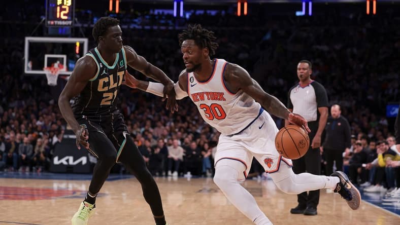 Mar 7, 2023; New York, New York, USA; New York Knicks forward Julius Randle (30) dribbles against Charlotte Hornets forward JT Thor (21) during the second half at Madison Square Garden. Mandatory Credit: Vincent Carchietta-USA TODAY Sports