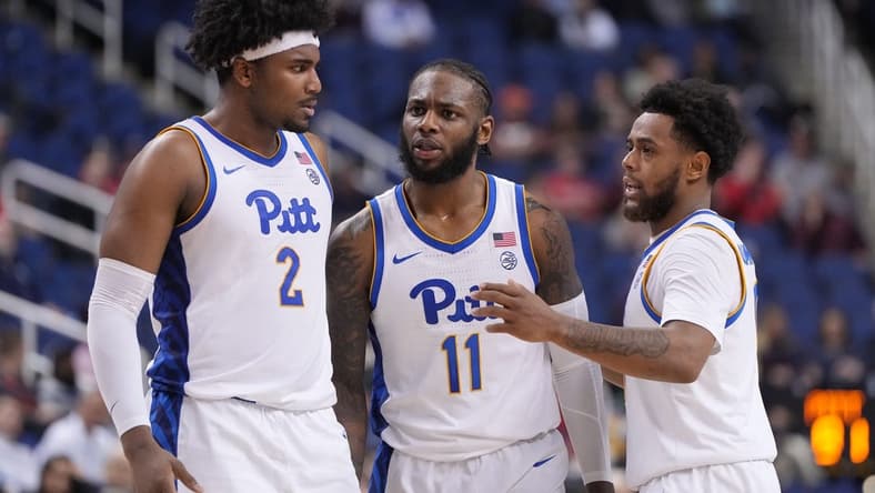 Mar 8, 2023; Greensboro, NC, USA; Pittsburgh Panthers forward Blake Hinson (2) and Pittsburgh Panthers guard Jamarius Burton (11) and Pittsburgh Panthers guard Nelly Cummings (0) huddle in the second half of the second round at Greensboro Coliseum. Mandatory Credit: Bob Donnan-USA TODAY Sports
