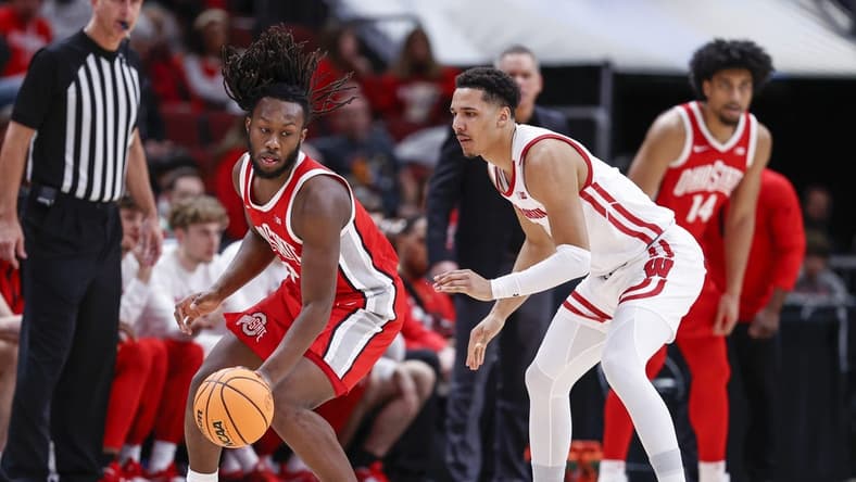 Mar 8, 2023; Chicago, IL, USA; Ohio State Buckeyes guard Bruce Thornton (2) is defended by Wisconsin Badgers guard Jordan Davis (2) during the second half at United Center. Mandatory Credit: Kamil Krzaczynski-USA TODAY Sports