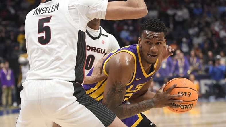 Mar 8, 2023; Nashville, TN, USA; Georgia Bulldogs center Frank Anselem (5) guards LSU Tigers forward Shawn Phillips (34) during the first half at Bridgestone Arena. Mandatory Credit: Steve Roberts-USA TODAY Sports