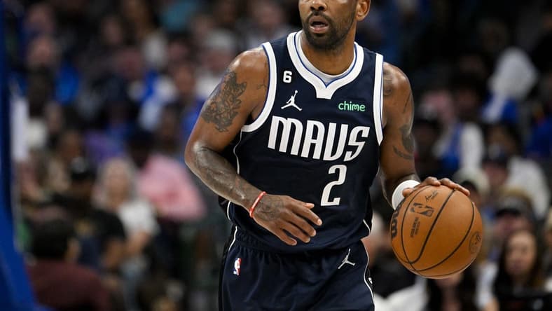 Mar 5, 2023; Dallas, Texas, USA; Dallas Mavericks guard Kyrie Irving (2) in action during the game between the Dallas Mavericks and the Phoenix Suns at the American Airlines Center. Mandatory Credit: Jerome Miron-USA TODAY Sports