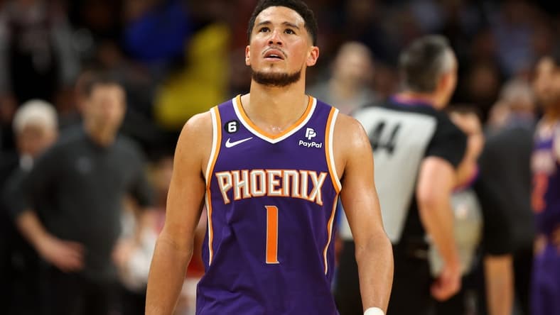 Mar 8, 2023; Phoenix, Arizona, USA; Phoenix Suns guard Devin Booker (1) reacts against the Oklahoma City Thunder in the first half at Footprint Center. Mandatory Credit: Mark J. Rebilas-USA TODAY Sports