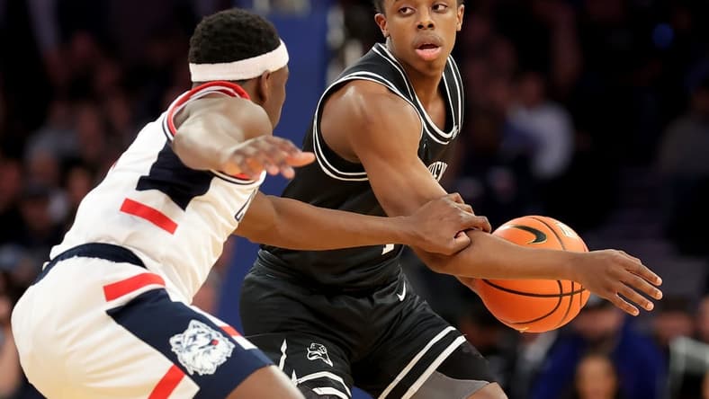Mar 9, 2023; New York, NY, USA; Providence Friars guard Jayden Pierre (1) controls the ball against Connecticut Huskies guard Hassan Diarra (5) during the first half at Madison Square Garden. Mandatory Credit: Brad Penner-USA TODAY Sports