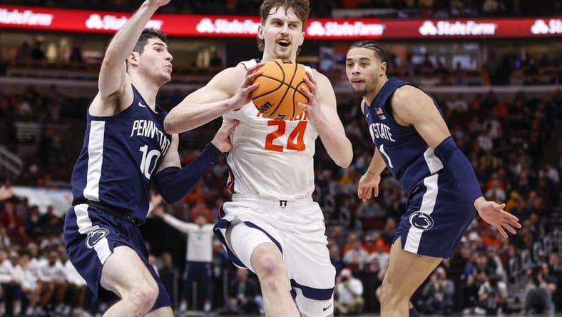 Mar 9, 2023; Chicago, IL, USA; Illinois Fighting Illini forward Matthew Mayer (24) drives to the basket against the Penn State Nittany Lions during the second half at United Center. Mandatory Credit: Kamil Krzaczynski-USA TODAY Sports