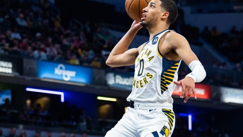 Mar 9, 2023; Indianapolis, Indiana, USA; Indiana Pacers guard Tyrese Haliburton (0) shoots the ball in the first quarter against the Houston Rockets at Gainbridge Fieldhouse. Mandatory Credit: Trevor Ruszkowski-USA TODAY Sports