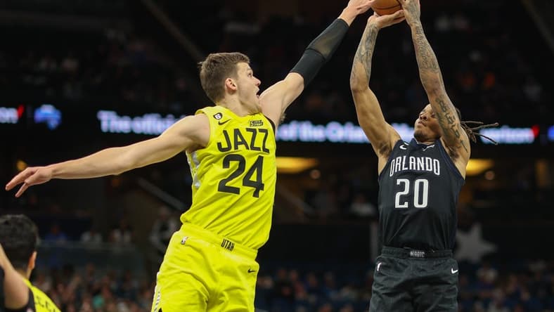 Mar 9, 2023; Orlando, Florida, USA; Orlando Magic guard Markelle Fultz (20) shoots the ball over Utah Jazz center Walker Kessler (24) in the second quarter at Amway Center. Mandatory Credit: Nathan Ray Seebeck-USA TODAY Sports