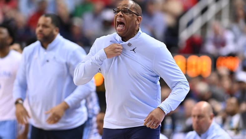 Mar 9, 2023; Greensboro, NC, USA; North Carolina Tar Heels head coach Hubert Davis reacts in the second half of the quarterfinals of the ACC tournament at Greensboro Coliseum. Mandatory Credit: Bob Donnan-USA TODAY Sports