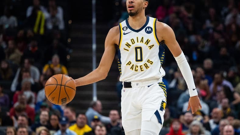 Mar 9, 2023; Indianapolis, Indiana, USA;  Indiana Pacers guard Tyrese Haliburton (0) dribbles the ball in the second quarter against the Houston Rockets at Gainbridge Fieldhouse. Mandatory Credit: Trevor Ruszkowski-USA TODAY Sports