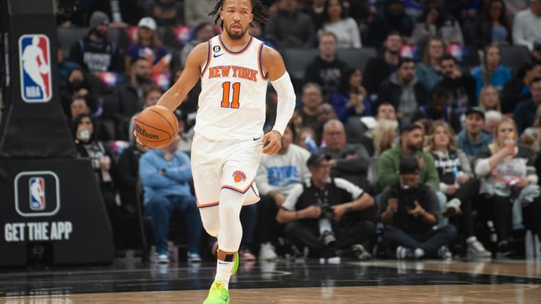 Mar 9, 2023; Sacramento, California, USA; New York Knicks guard Jalen Brunson (11) brings the ball up the court during the first quarter of the game against the Sacramento Kings at Golden 1 Center. Mandatory Credit: Ed Szczepanski-USA TODAY Sports