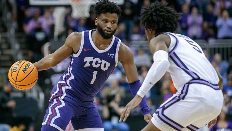 Mar 9, 2023; Kansas City, MO, USA; TCU Horned Frogs guard Mike Miles Jr. (1) is defended by Kansas State Wildcats guard Cam Carter (5) during the second half at T-Mobile Center. Mandatory Credit: William Purnell-USA TODAY Sports