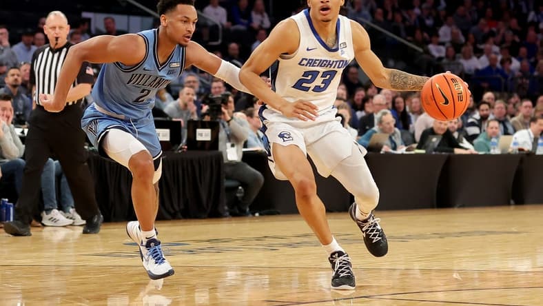 Mar 9, 2023; New York, NY, USA; Creighton Bluejays guard Trey Alexander (23) drives to the basket against Villanova Wildcats guard Mark Armstrong (2) during the second half at Madison Square Garden. Mandatory Credit: Brad Penner-USA TODAY Sports