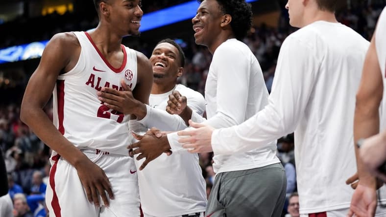 Alabama forward Brandon Miller (24) is congratulated by teammates during the second half of a SEC Men s Basketball Tournament quarterfinal game against Mississippi State at Bridgestone Arena in Nashville, Tenn., Friday, March 10, 2023.
Ala Miss G7 031023 An 036