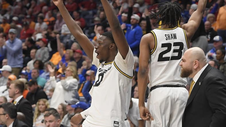 Mar 10, 2023; Nashville, TN, USA; Missouri Tigers forward Mohamed Diarra (0) and forward Aidan Shaw (23) celebrate the win against the Tennessee Volunteers during the second half at Bridgestone Arena. Mandatory Credit: Steve Roberts-USA TODAY Sports