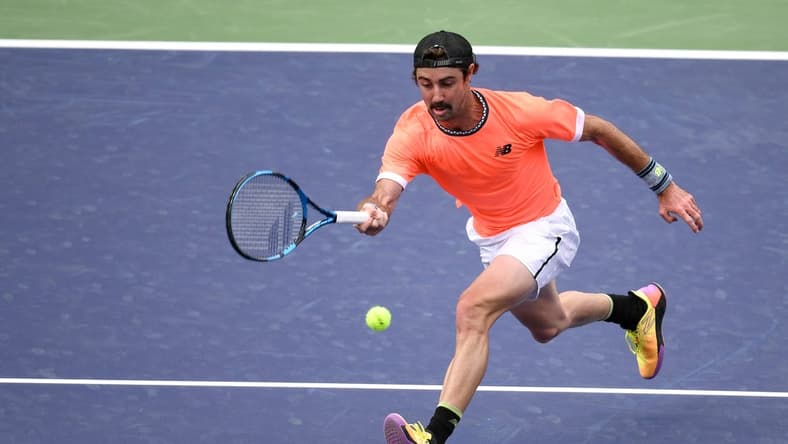 Mar 10, 2023; Indian Wells, CA, USA; Jordan Thompson (AUS) hits a forehand approach shot during his 2nd round match against Stefanos Tsitsipas (GRE) (not pictured) during the BNP Paribas Open at Indian Wells Tennis Garden. Mandatory Credit: Jonathan Hui-USA TODAY Sports