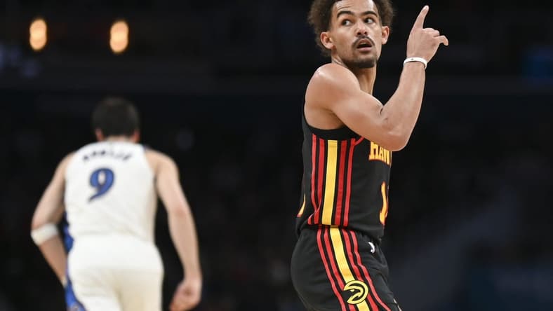 Mar 10, 2023; Washington, District of Columbia, USA;  Atlanta Hawks guard Trae Young (11) reacts after making a three point shot during the first half against the Washington Wizards at Capital One Arena. Mandatory Credit: Tommy Gilligan-USA TODAY Sports