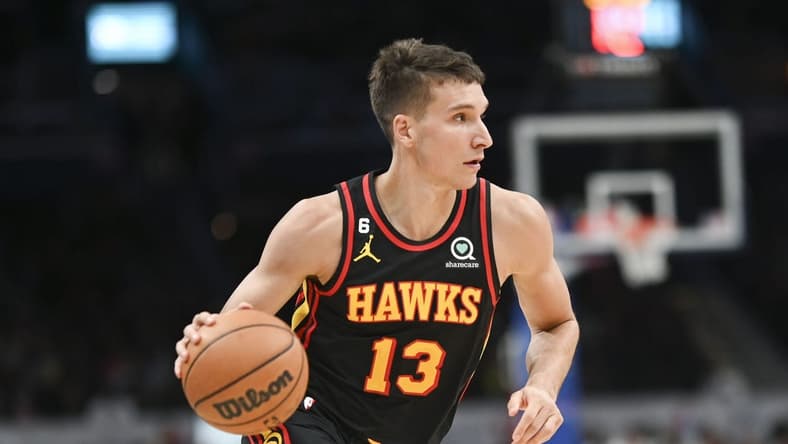 Mar 10, 2023; Washington, District of Columbia, USA; Atlanta Hawks guard Bogdan Bogdanovic (13) dribbles during the first half against the Washington Wizards at Capital One Arena. Mandatory Credit: Tommy Gilligan-USA TODAY Sports