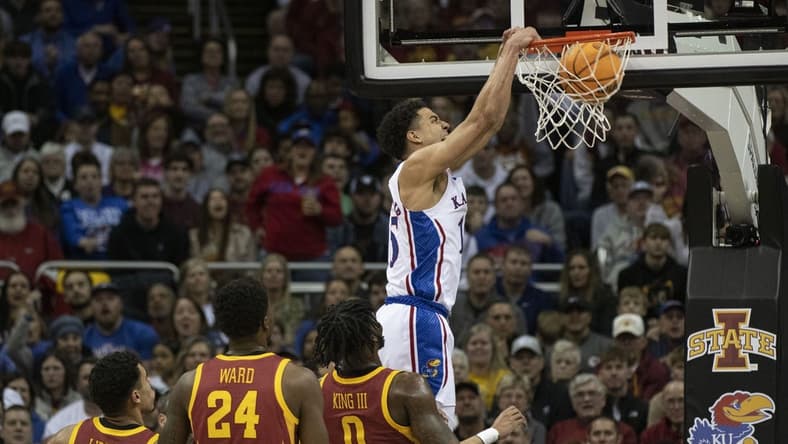 Mar 10, 2023; Kansas City, MO, USA; Kansas Jayhawks guard Kevin McCullar Jr. (15) dunks the ball against the Iowa State Cyclones in the first half at T-Mobile Center. Mandatory Credit: Amy Kontras-USA TODAY Sports