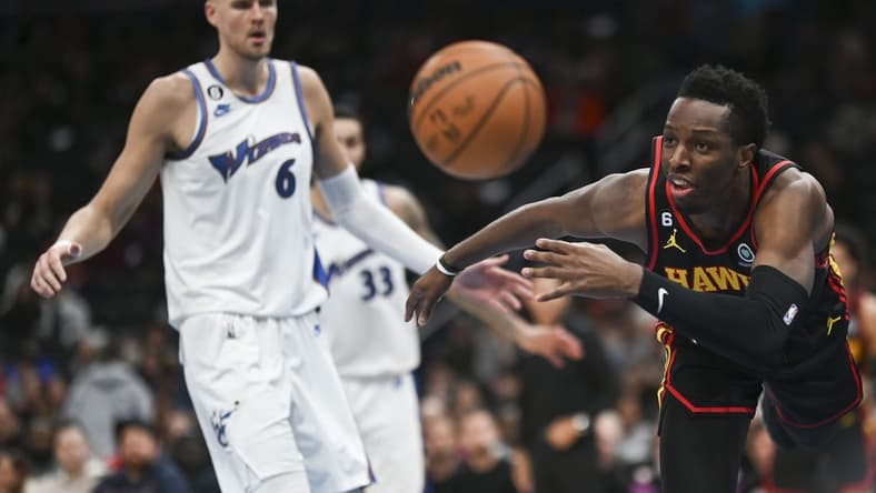 Mar 10, 2023; Washington, District of Columbia, USA;  Atlanta Hawks forward Onyeka Okongwu (17) divers for loose ball during the first half against the Washington Wizards at Capital One Arena. Mandatory Credit: Tommy Gilligan-USA TODAY Sports