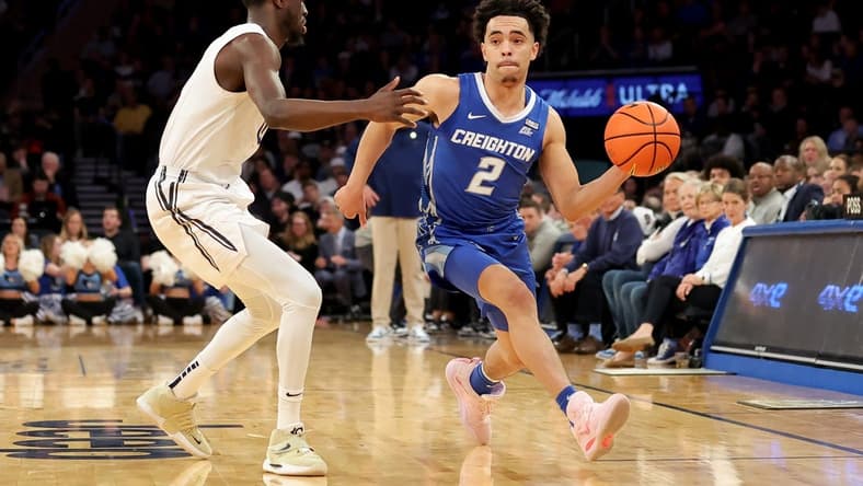 Mar 10, 2023; New York, NY, USA; Creighton Bluejays guard Ryan Nembhard (2) looks to pass the ball against Xavier Musketeers guard Souley Boum (0) during the first half at Madison Square Garden. Mandatory Credit: Brad Penner-USA TODAY Sports