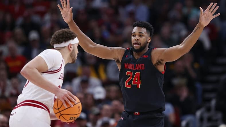 Mar 10, 2023; Chicago, IL, USA; Maryland Terrapins forward Donta Scott (24) defends against Indiana Hoosiers forward Race Thompson (left) at United Center. Mandatory Credit: Kamil Krzaczynski-USA TODAY Sports