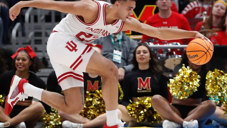 Indiana Hoosiers forward Trayce Jackson-Davis (23) goes after a loose ball during the Big Ten Men s Basketball Tournament game against the Maryland Terrapins, Friday, March 10, 2023, at United Center in Chicago. Indiana won 70-60.
Iumary031023 Am17162